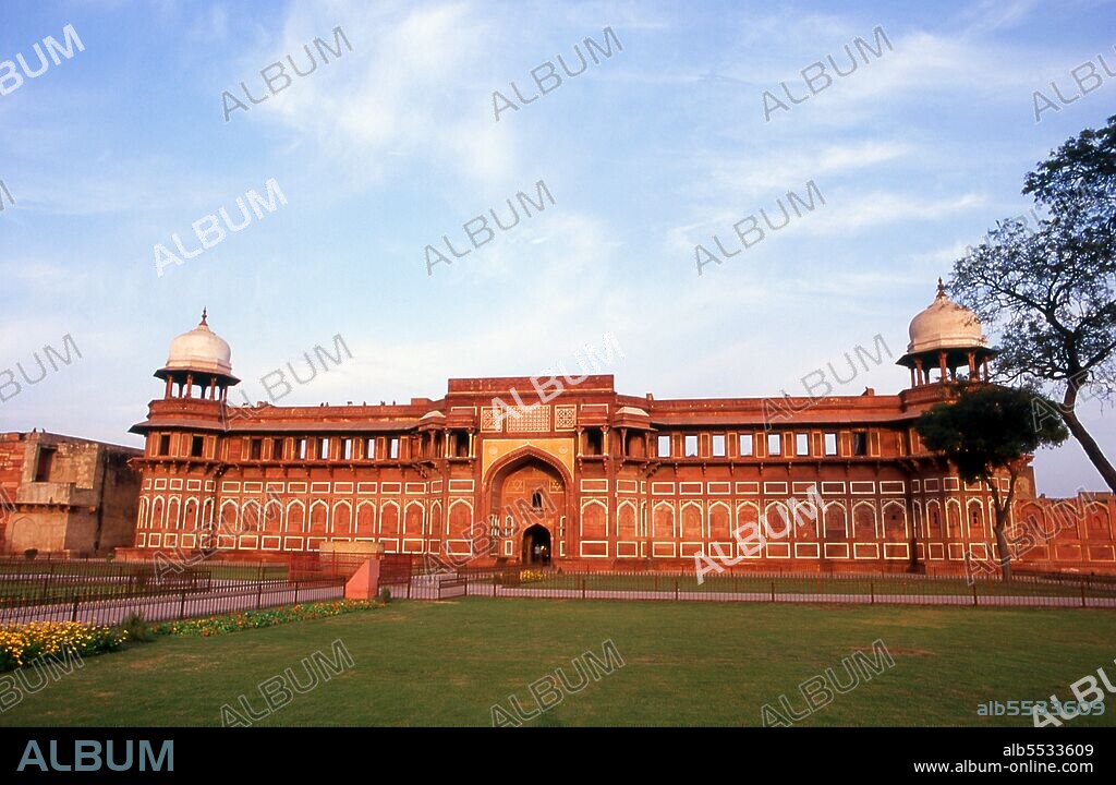 Agra Fort was originally a brick fort, held by the Hindu Sikarwar Rajputs. It was mentioned for the first time in 1080 CE when a Ghaznavide force captured it. Sikandar Lodi (1488–1517) was the first Sultan of Delhi who shifted to Agra and lived in the fort. He governed the country from here and Agra assumed the importance of the second capital. After the First Battle of Panipat in 1526, Mughals captured the fort. The victorious Babur stayed in the fort in the palace of Ibrahim and built a baoli (step well) in it. The emperor Humayun was crowned here in 1530. Humayun was defeated at Bilgram in 1540 by Sher Shah Suri. The fort remained with Suris till 1555, when Humayun recaptured it. The Hindu king Hem Chandra Vikramaditya, also called 'Hemu', defeated Humayun's army, led by Iskandar Khan Uzbek, and won Agra. Hemu got a huge booty from this fort and went on to capture Delhi from the Mughals. The Mughals under Akbar defeated King Hemu finally at the Second Battle of Panipat in 1556. Realizing the importance of its central situation, Akbar made it his capital and arrived in Agra in 1558. The fort was in a ruined condition and Akbar had it rebuilt with red sandstone, completing it in 1573. It was only during the reign of Akbar's grandson, Shah Jahan, that the site took on its current state.