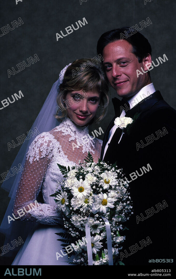 MARK BLUM and ROSANNA ARQUETTE in DESPERATELY SEEKING SUSAN, 1985, directed by SUSAN SEIDELMAN. Copyright ORION PICTURES.