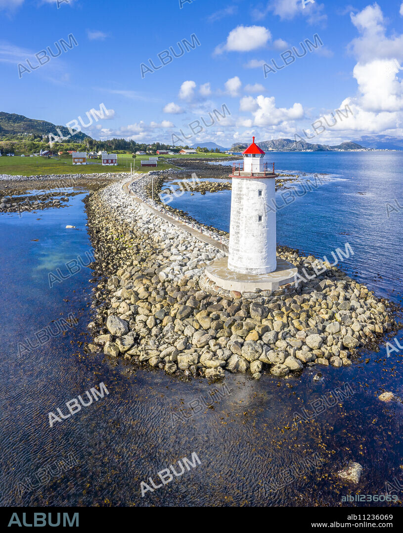 Front view of Hogsteinen Lighthouse, aerial view by drone, Godoya Island, Alesund, More og Romsdal County, Norway, Scandinavia, Europe.