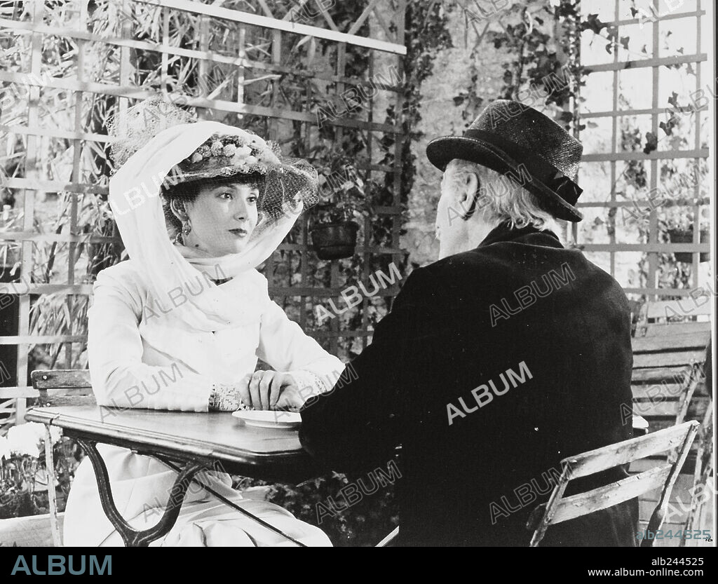 LOUIS DUCREUX and SABINE AZEMA in SUNDAY IN THE COUNTRY, 1974.