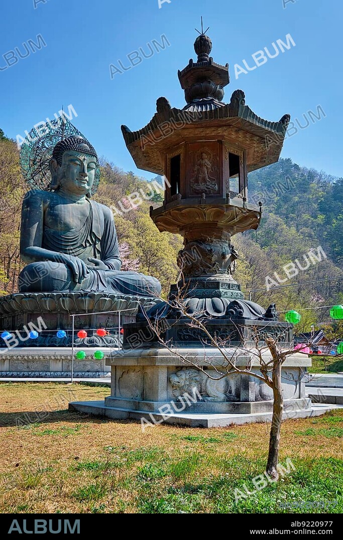 SEORAKSA, SOUTH KOREA, APRIL 15, 2017: The Great Unification Buddha Tongil Daebul is a 14. 6-meter 108 ton Bronze Buddha statue in Seoraksan National Park, South Korea, Asia.