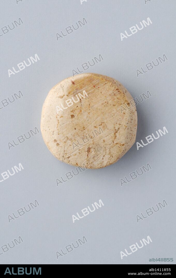Game sheet limestone. 0.5 x 2.0 cm. ( 2nd- 4 th CE ) - Roman period, from the archaeological site of Complutum in Alcala de Henares (Madrid). SPAIN.