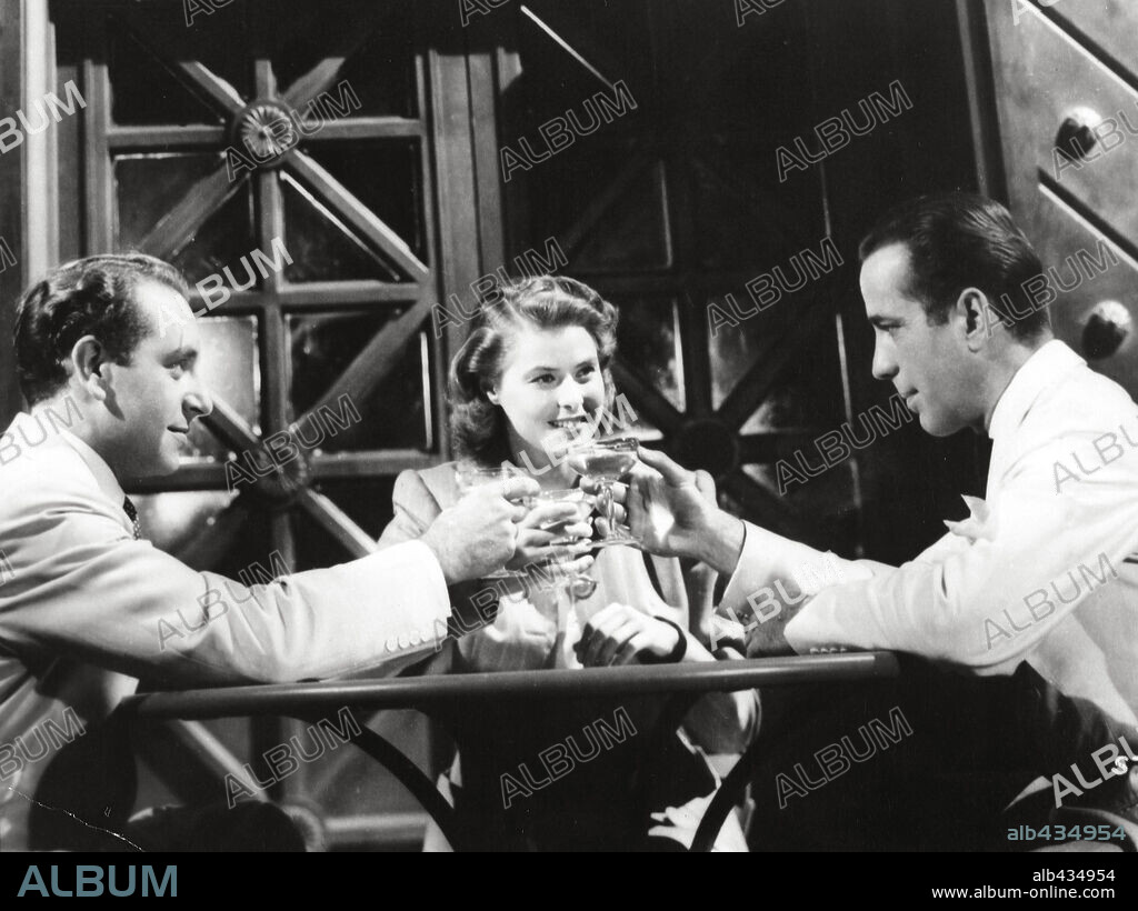 HUMPHREY BOGART, INGRID BERGMAN and PAUL HENREID in CASABLANCA, 1942, directed by MICHAEL CURTIZ. Copyright WARNER BROTHERS.