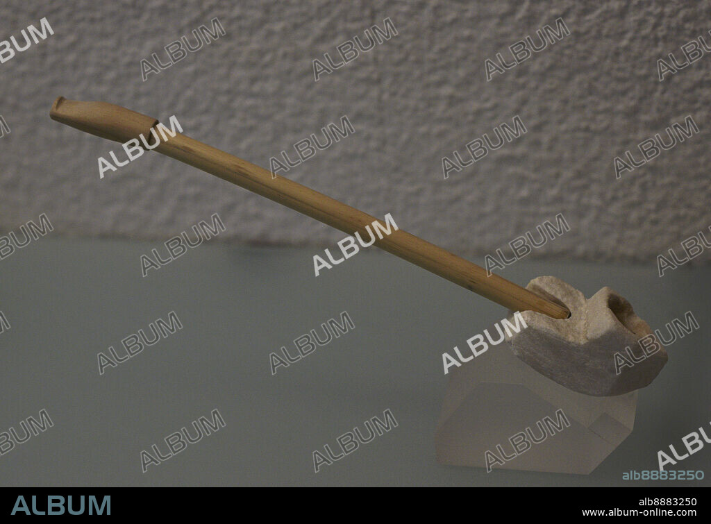 Hispano-Muslim pipe. 14th century. Used to consume hashish in the hammam (bath). The handle is a modern reconstruction. Marble. From Toledo. Sephardic Museum. Toledo. Castile-La Mancha. Spain.