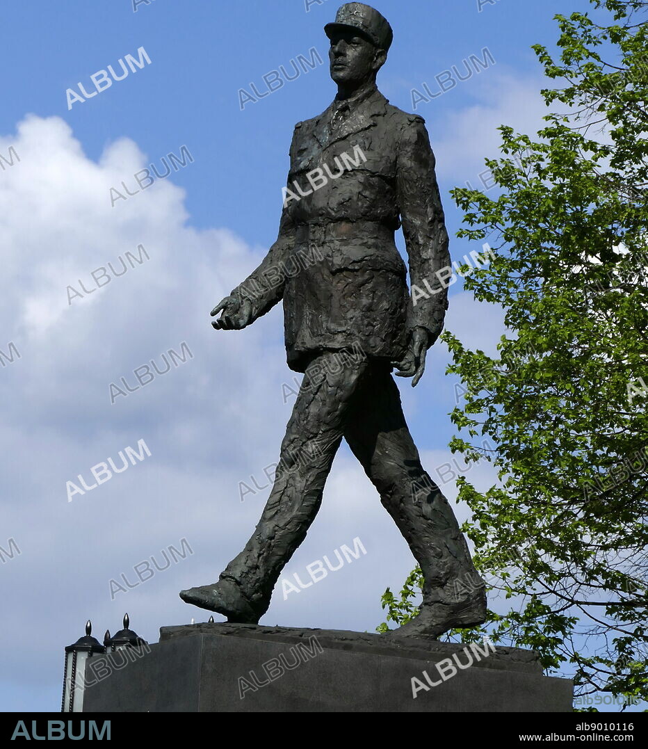 Photograph of a statue of the former President of France, Charles de Gaulle, is the subject of one of Warsaws more prominent monuments. Striding away from what was once the Communist party HQ, the monument is a gift from the French government. Dated 21st Century.