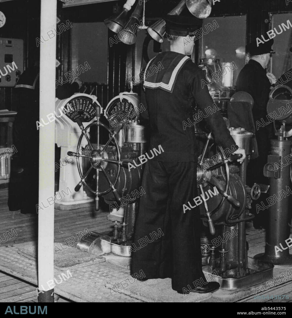 ***** bridge of the "Queen Elizabeth" ***** Sir James Bisset directing **. ***** Ready for her maiden voyage as *****. ***** largest and most luxurious liner, the ***** "Queen Elizabeth", is now at ***** readiness for her first voyage to ***** being "demobbed" from war service. ***** has been completely overhauled and ***** many celebrities, including M. Molotov ***** of the Soviet delegation to the *****, will be among the passengers. September 15, 1946.