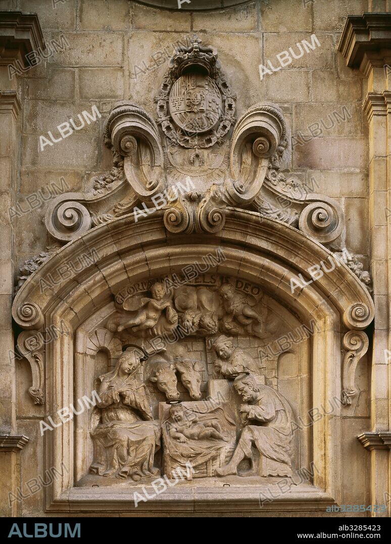 Iglesia del Betlem. "La Natividad". Relieve central en forma de retablo, situado sobre la puerta principal de la fachada. Obra de Francesc de Santacruz, en el año 1690. Barcelona. Cataluña.