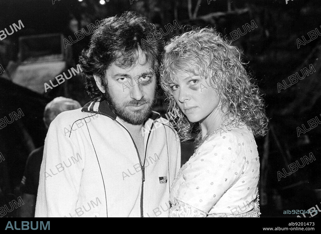BLACK EYE, KATE CAPSHAW and STEVEN SPIELBERG. KATE CAPSHAW and STEVEN SPIELBERG in INDIANA JONES AND THE TEMPLE OF DOOM, 1984, directed by STEVEN SPIELBERG. Copyright LUCASFILM LTD/PARAMOUNT.