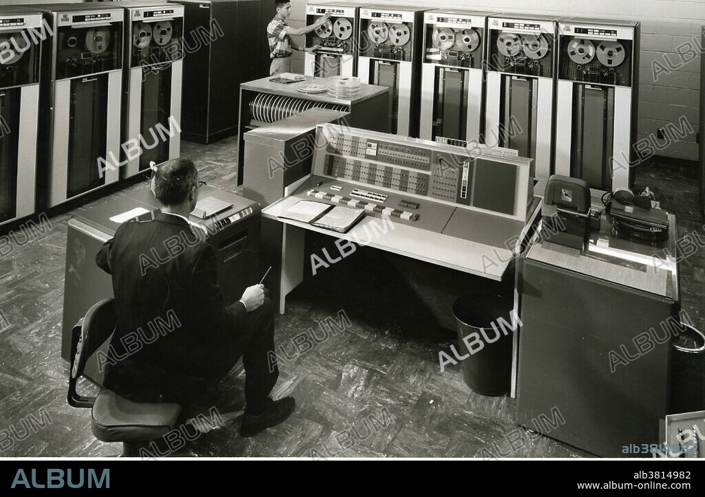 In April 1960 the first of four IBM 7090s was delivered to Lawrence Livermore National Laboratory. The IBM 7090 was a second-generation transistorized version of the earlier IBM 709 vacuum tube mainframe computers and was designed for "large-scale scientific and technological applications". The 7090 was the third member of the IBM 700/7000 series scientific computers. The first 7090 installation was in November 1959.  The 7090 used a 36-bit word length, with an address-space of 32K (32,768) words. It operated with a basic memory cycle of 2.18 ?s, using the IBM 7302 Core Storage core memory technology from the IBM 7030 (Stretch) project. With a processing speed of around 100 Kflop/s, the 7090 was six times faster than the 709, and could be rented for half the price. No photographer credited, circa 1960s.