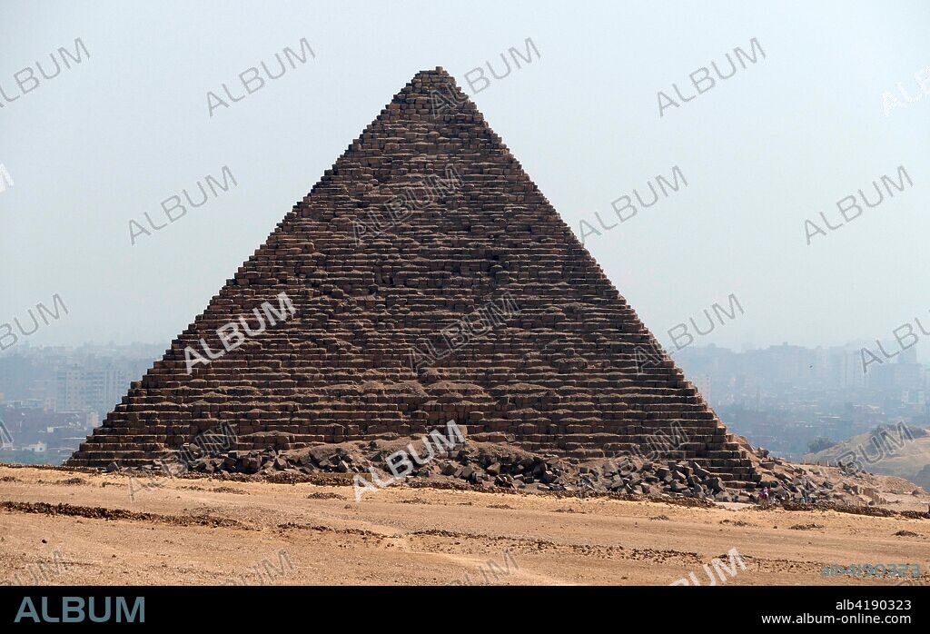 The Pyramid of Menkaure. on the Giza Plateau. Cairo. Egypt. is the smallest of the three main Pyramids of Giza. It is thought to have been built to serve as the tomb of the fourth dynasty Egyptian Pharaoh Menkaure. approx. 2500 BC.