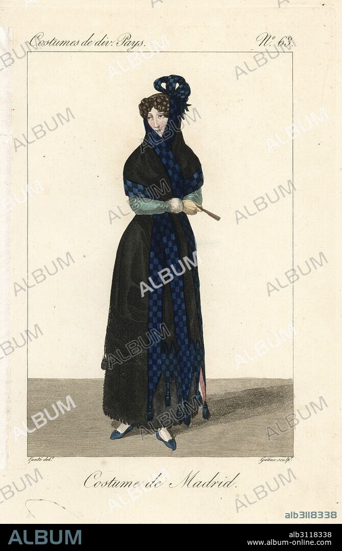 Woman of Madrid, Spain, 19th century. She wears the traditional black mantilla veil trimmed with blue check and tassels, black basquina dress, and carries a fan. Handcoloured copperplate engraving by Georges Jacques Gatine after an illustration by Louis Marie Lante from Costumes of Various Countries, Costumes de Divers Pays, Paris, 1827.
