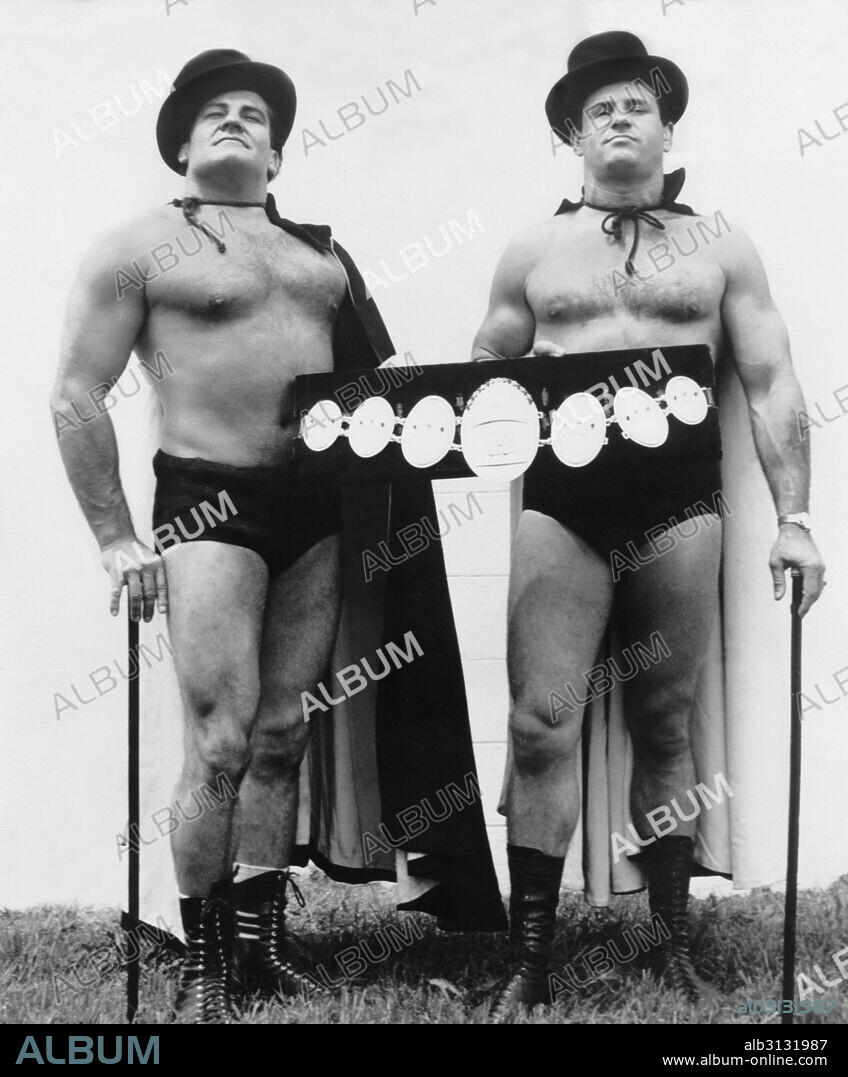 United States:  c. 1962 Professional wrestlers Magnificent Maurice (Gene Dubuque) and Handsome Johny Barend pose for a promotional poetrait.