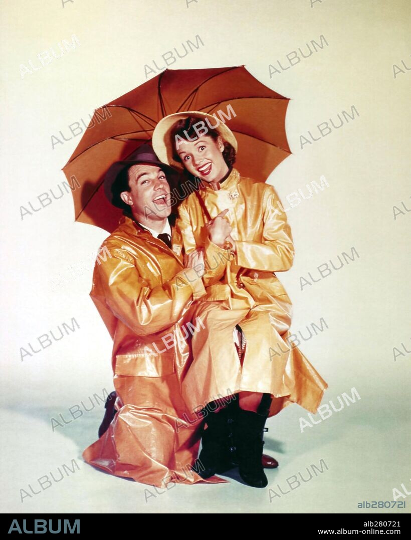 DEBBIE REYNOLDS and GENE KELLY in SINGIN' IN THE RAIN, 1952, directed by GENE KELLY and STANLEY DONEN. Copyright M.G.M.