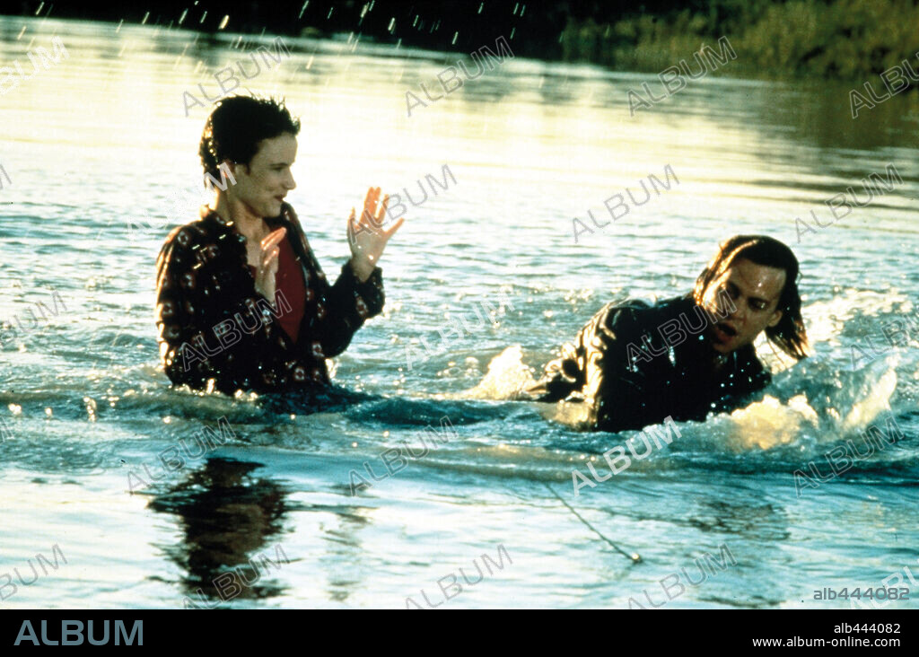 JOHNNY DEPP and JULIETTE LEWIS in WHAT'S EATING GILBERT GRAPE?, 1993, directed by LASSE HALLSTROM. Copyright PARAMOUNT PICTURES.