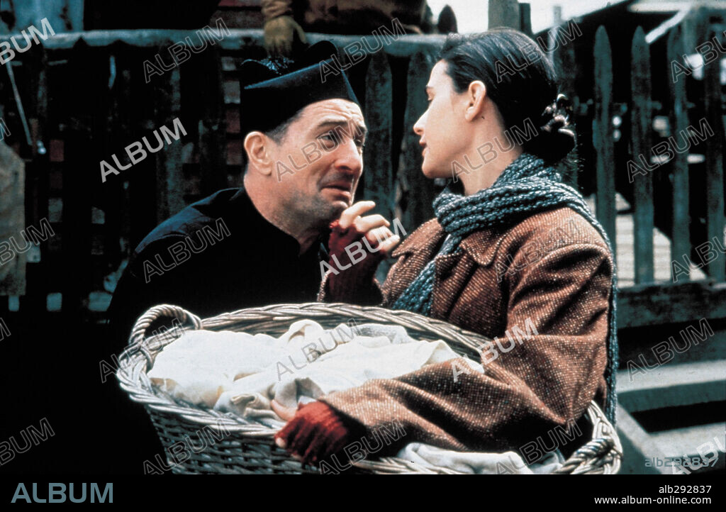 DEMI MOORE and ROBERT DE NIRO in WE'RE NO ANGELS, 1989, directed by NEIL JORDAN. Copyright PARAMOUNT PICTURES.
