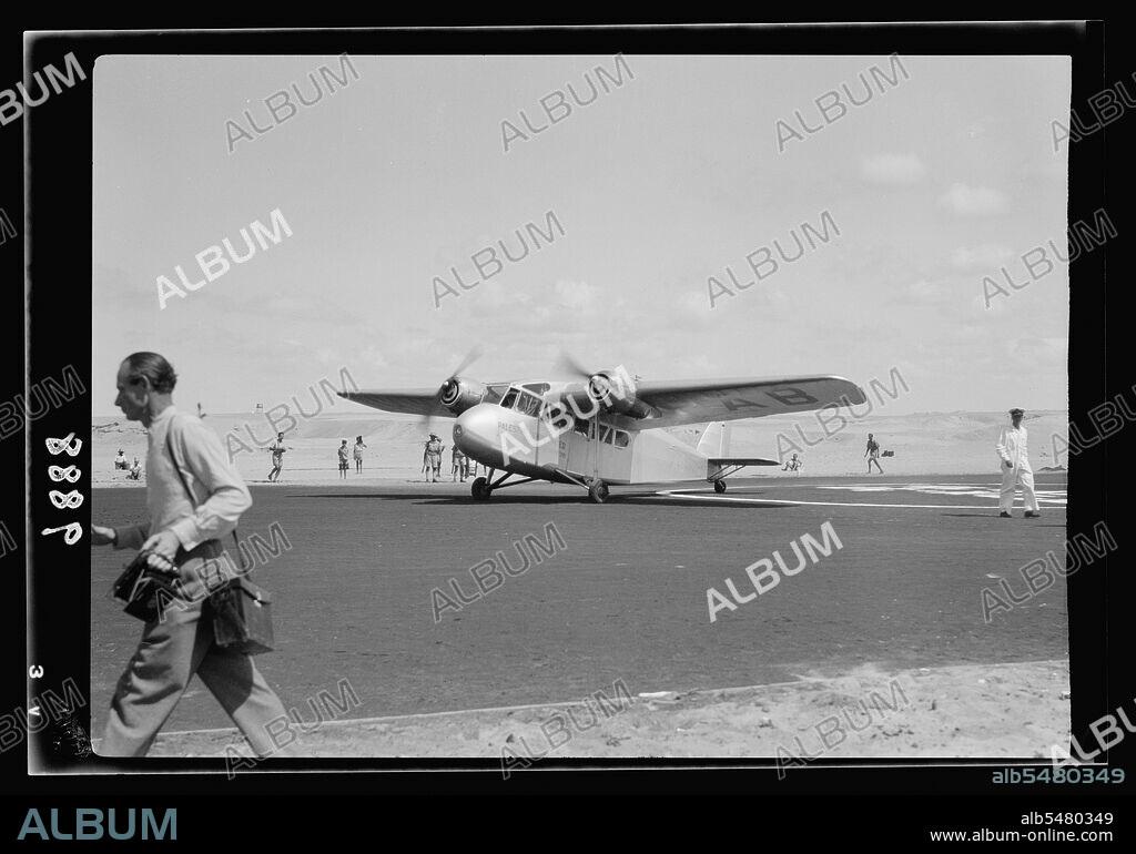 Inauguration of Tel-Aviv landing ground. Palestine Airways. A plane taxing or taxiing] to take position for takeoff ca. 1938.