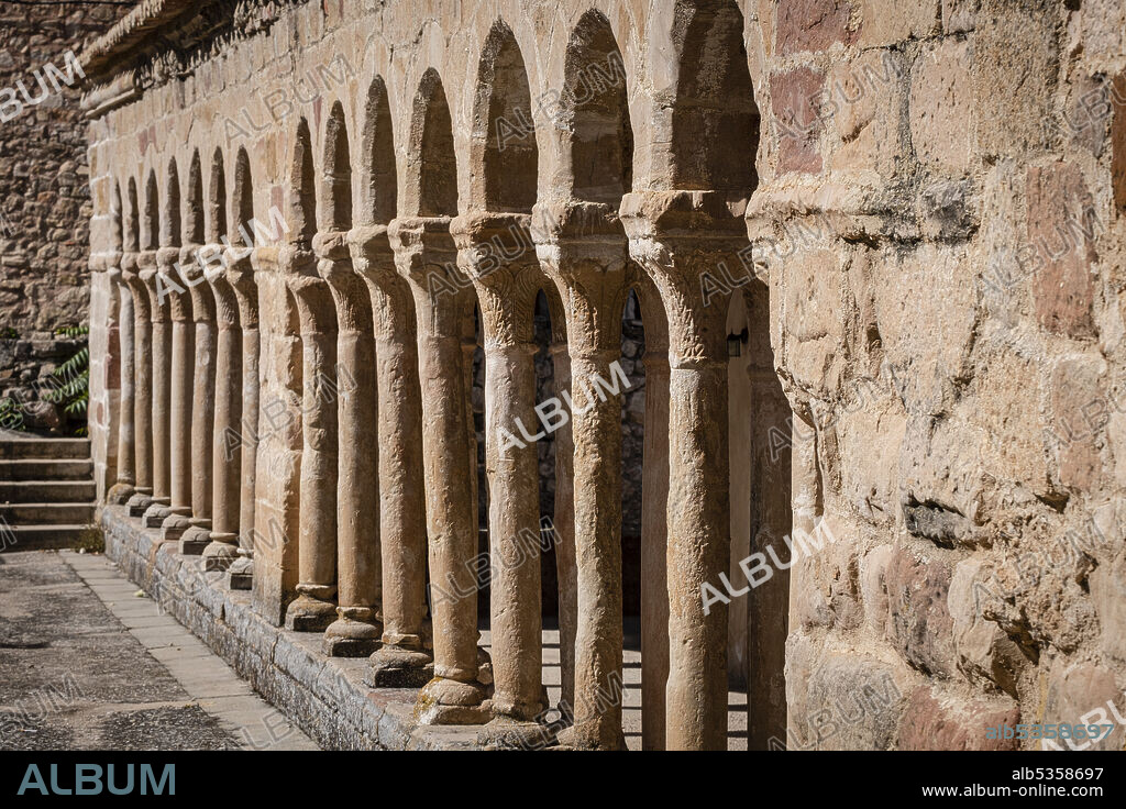 arcaded gallery of semicircular arches on paired columns, Church of the Savior, 13th century rural Romanesque, Carabias, Guadalajara, Spain.