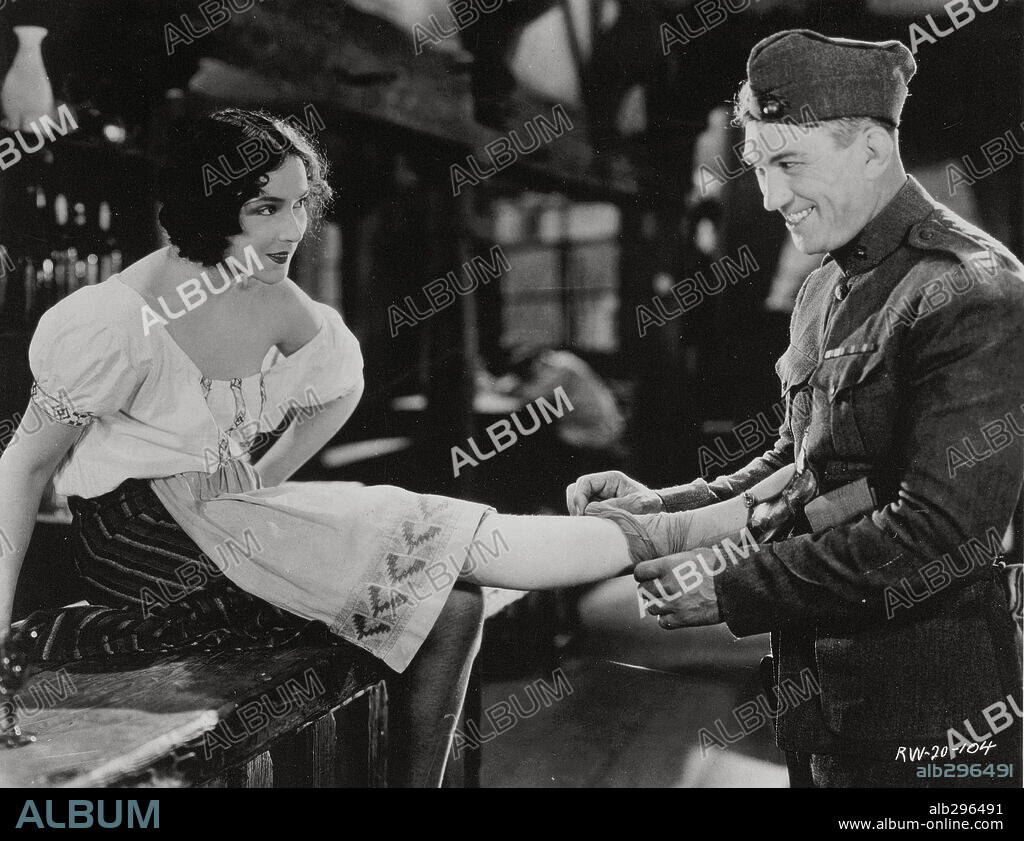 DOLORES DEL RIO and VICTOR McLAGLEN in WHAT PRICE GLORY, 1926, directed by RAOUL WALSH. Copyright FOX FILMS.