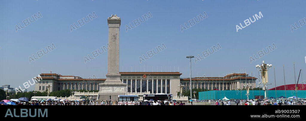 The Monument to the People's Heroes stands in front of the Great Hall of the People, Beijing. A ten-story obelisk that was erected as a national monument of China to the martyrs of revolutionary struggle during the 19th and 20th centuries.