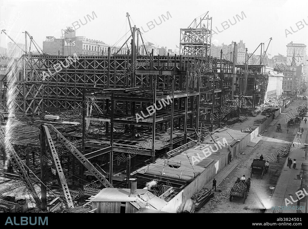 Pennsylvania Railroad Station, under construction, October 1908. Pennsylvania Station was a historic railroad station, named for the Pennsylvania Railroad, its builder and original tenant, and shared its name with several stations in other cities. It was designed by McKim, Mead, and White and completed in 1910. The original Pennsylvania Station was considered a masterpiece of the Beaux-Arts style and one of the architectural jewels of New York City. Occupying two city blocks from Seventh Avenue to Eighth Avenue and from 31st to 33rd Streets, the original Pennsylvania Station building was 784 by 430 feet, covering an area of 8 acres. As rail usage declined in the 1950s, the Pennsylvania Railroad sold the air rights to the property and downsized the railroad station. The above ground head house and train shed of the station were demolished and replaced by Madison Square Garden and Pennsylvania Plaza between 1963 and 1969. The destruction of Pennsylvania Station galvanized support for architectural preservation across the United States, leading to the advent of modern historical preservation. Bain News Service image October, 1908.
