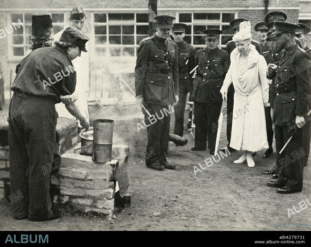 'Watching A.T.S. girls at work with a field kitchen during one of her visits to the Army School of Cookery at Aldershot', c1941, (1951). Queen Mary of Teck (1867-1953) is given a cookery display by members of the Auxiliary Territorial Service during the Second World War. From "The Queen Mother", by Marion Crawford ("Crawfie"), governess of Princess Margaret and Princess Elizabeth (the future Queen Elizabeth II). [George Newnes Limited, London, 1951].