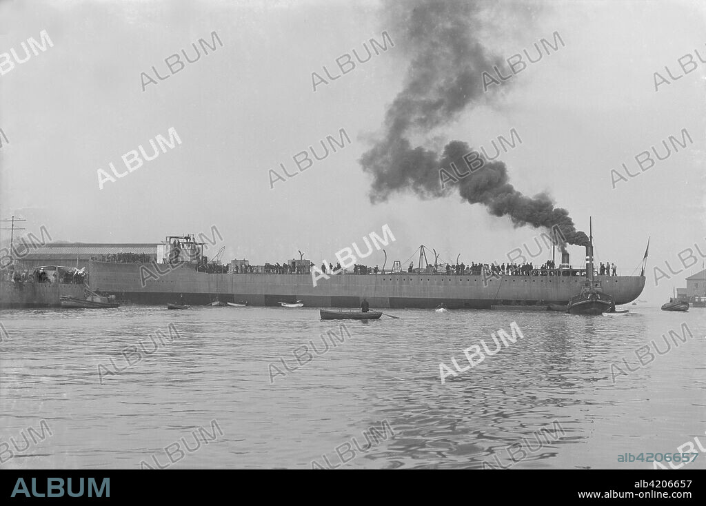 The launch of 'Almirante Simpson' at J. Samuel White shipyard, Cowes, 26th February 1914. 'HMS Faulknor' was a British destroyer of the First World War. She was purchased by the Royal Navy whilst still under construction in Britain for the Chilean Navy who had ordered her in 1912 as part of the Almirante Lynch class. She was renamed after the Faulknor family of British nineteenth century naval officers. In 1920, following the end of the war, Faulknor and her surviving sisters were all returned to Chile, where she served as Almirante Riveros until 1933.