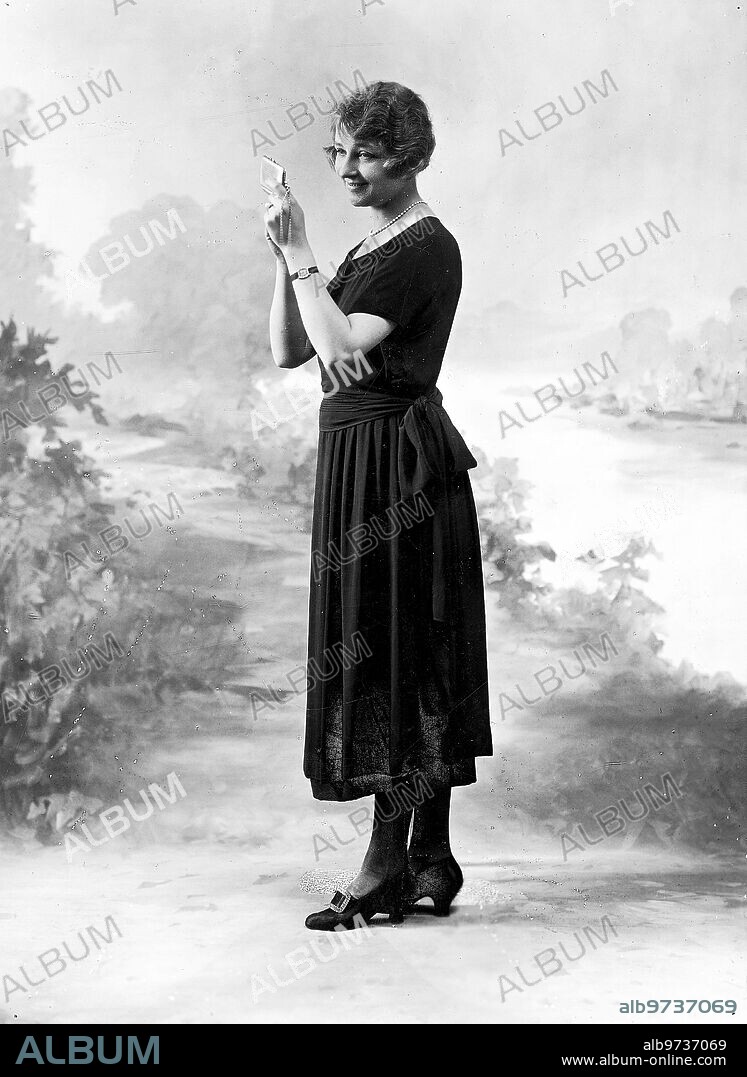 August 1921. Fashion Chronicle. Elegant Black Crespon de Chine dress, model from the Sixta house.