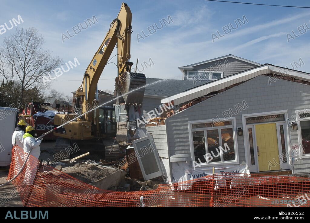 Hurricane Sandy Aftermath. Demolition of damaged house. Breezy Pt. Queens, NY.