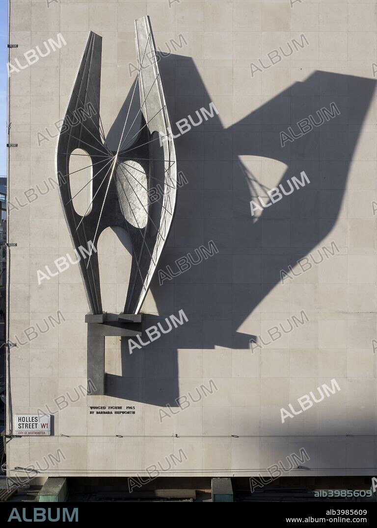 'Winged Figure', sculpture by Barbara Hepworth, Oxford Street, London, 2015. View of the sculpture, dating from 1963, mounted on the Holles Street elevation of the John Lewis Department Store.