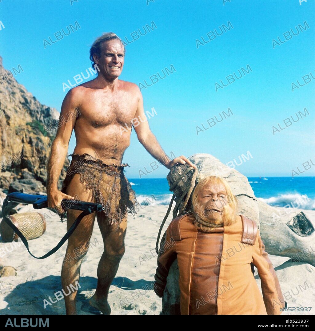 CHARLTON HESTON and MAURICE EVANS in PLANET OF THE APES, 1968, directed by FRANKLIN J. SCHAFFNER. Copyright 20TH CENTURY FOX.