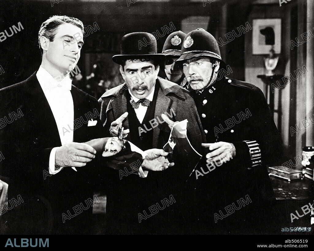 CHARLES KORVIN and J. CARROL NAISH in ARSENE LUPIN RETURNS, 1938, directed by GEORGE FITZMAURICE.