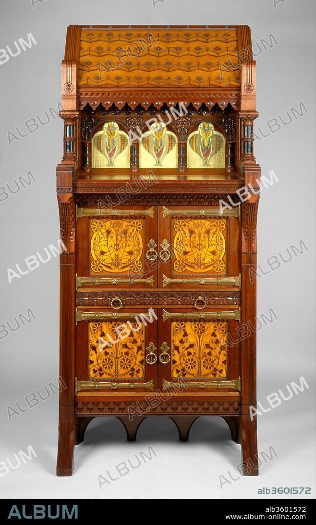 Cabinet. Culture: American. Dimensions: 96 x 42 x 20 in. (243.8 x 106.7 x 50.8 cm). Maker: Attributed to Daniel Pabst (1826-1910). Date: ca. 1877-80.
This Modern Gothic cabinet superbly demonstrates the influence of British reform theory on American design in the late nineteenth century. In form and decoration, it is indebted to the British architect Bruce J. Talbert, whose book "Gothic Forms Applied to  Furniture, Metal Work, and Decoration for Domestic Purposes" (Birmingham, 1867; Boston, 1873) was influential in this country. A kinship with the work of the Philadelphia architect Frank Furness is also evident in the overall form of the cabinet, the verticality and shingled "roof" of which somewhat resemble Furness's bank buildings of the 1870s. The reverse-painted ribbed-glass panels are of a type Furness began to use on buildings as architectural decoration in 1876. Their stylized floral motif recalls the geometric plant forms of Christopher Dresser, a leading English ornamentist of the period who visited the Centennial Exhibition in Philadelphia in 1876 and whose published  designs were well known in this country. Daniel Pabst, a leading manufacturer of artistic furniture in Philadelphia, probably executed the cabinet. A related cabinet, now in the Brooklyn Museum of Art, is documented to Pabst.