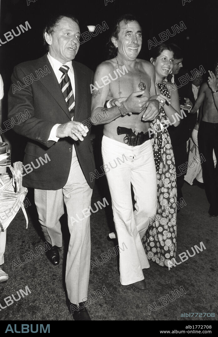 Frank and Tina Sinatra with Robert Viale. The Italian-American singer and actor Frank Sinatra smiling with his daughter Tina and Robert Viale, the owner of the restaurant 'Le Pirate'. Roquebrune Cap Martin, 1970s.