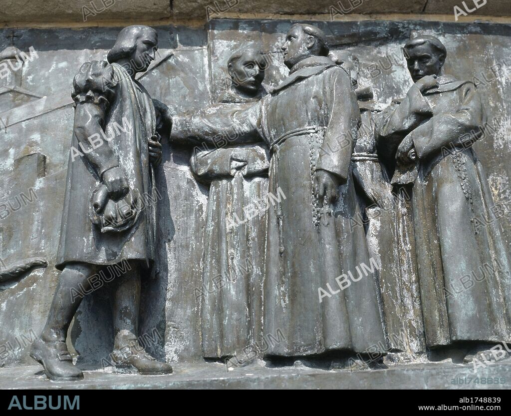 Spain. Catalonia. Barcelona. The Monument of Christopher Columbus. Designed by Gaieta Buigas (1851-1919). Detail of bas-relief. "Columbus visiting the Monastery of Santa Maria de la Rabida", 1929 by scuptor Josep Tenas (1892-1943).