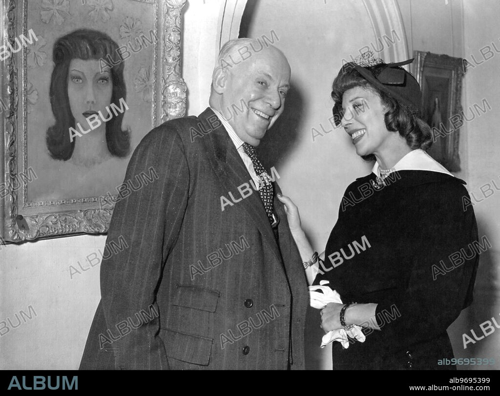 Conversation in the Lefevre Galleries , Bruton Street , London , between Charles Blake Cochran and former Viennese dancing star Tilly Losch . On the left is a self - portrait of Miss Losch , painted in 1944 . 14 September 1950.