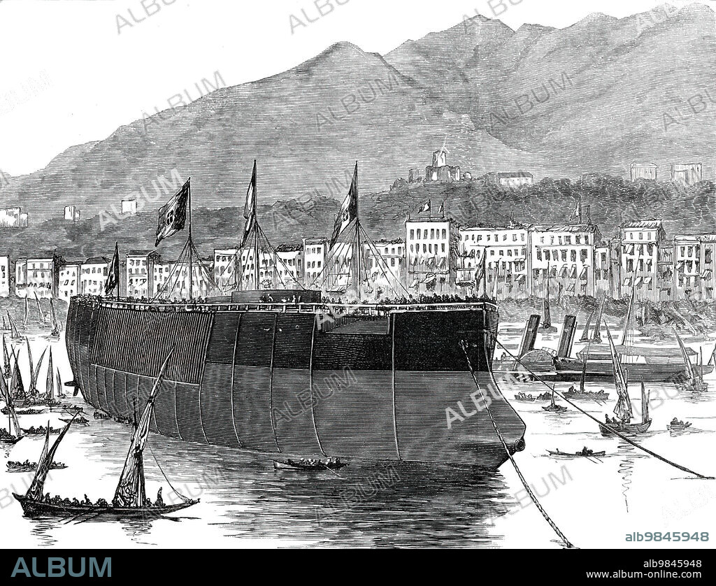 The Duilio, Italian Ironclad, recently launched at Castellamare, Bay of Naples, 1876. Engraving from a sketch by Mr. H. Cooke, of Rome. 'The Duilio takes her name from Caius Duilius, who was appointed Roman Consul 260 years before the birth of Christ...[She was] constructed for the Italian Royal Navy...The ceremony was simple. After the priests had given their benediction to the vessel, Princess Margherita pulled the ribbons which were attached to the baptismal bottle of champagne, and the hitherto nameless monster became the Duilio...the ship reposed unsupported in her cradle; the hydraulic pumps were used; and away she went, as easily and gracefully as ever any vessel took to the water. There was not the slightest let or hindrance during the whole operation. The Italians may congratulate themselves on the successful birth of perhaps the largest vessel of war in the world'. From "Illustrated London News", 1876.