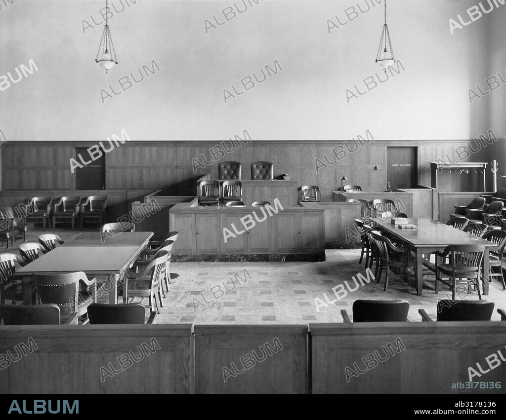 Milwaukee, Wisconsin:  c. 1930. Judge Page's courtroom in the Safety Building.The Court Reporter room is at the left and the Judge's Chambers at the right.   © Underwood Archives / The Image Works.