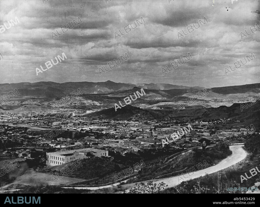 Tegucigalpa, Honduras - Tegucigalpa, the capital Honduras, has population of 90,000 (including the contiguous town of Comayaguela); Honduras is an agricultural and cattle raising state of Central America. Its chief export is bananas, which count for 65% of the produce going from the country; mineral resources are abundant but undeveloped, and they include gold, silver, copper, lead, zinc, iron and coal. July 5, 1954. (Photo by Camera Press).
