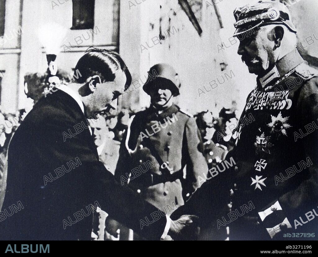 Photographic print of President Paul von Hindenburg (1847-1934) shaking hands with Adolf Hitler (1889-1945) in Poland. Dated 20th Century.