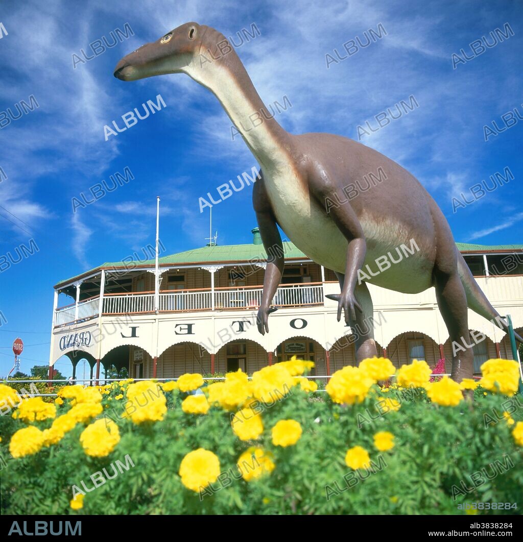 Muttaburrasaurus reconstruction in Hughenden, North Queensland, Australia. Muttaburrasaurus roamed Australia about 100 million years ago, during the Cretaceous Period. About seven meters long, this ornithopod dinosaur was probably a bipedal plant eater. It had a hollow chamber in its snout which may have been a resonator for loud calls. Based on the distribution of fossils found, Muttaburrasaurus may have been a common and widespread dinosaur from 210 to 65 million years ago.