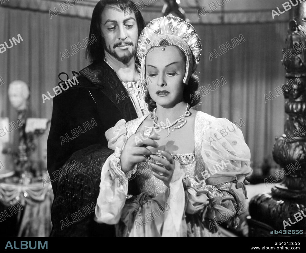 MACDONALD CAREY y PAULETTE GODDARD en LA MASCARA DE LOS BORGIA, 1949 (BRIDE OF VENGEANCE), dirigida por MITCHELL LEISEN. Copyright PARAMOUNT PICTURES.