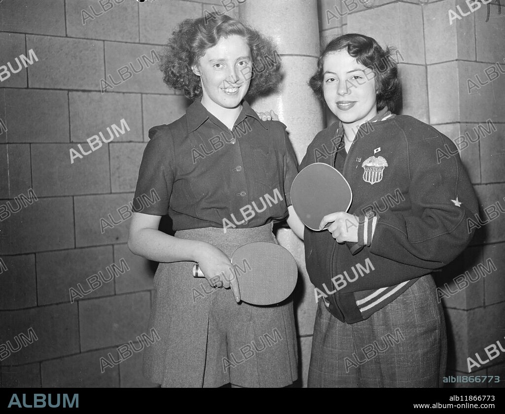 SCOTTISH - AMERICAN TABLE TENNIS FINAL. HELEN ELLIOT - 22 year - old - Edinburgh girl , ( left ) and PEGGY McLean , the American NO . 1 player , who will battle out the final of the women's singles at the English open table tennis championships at Wembley . Helen played a brilliant game in yesterday's semi final when she beat the American , Mildred Shahian , in spite of suffering agonies of neuralgia . She hopes to lose the pain before tonight's match . 19 February 1949.