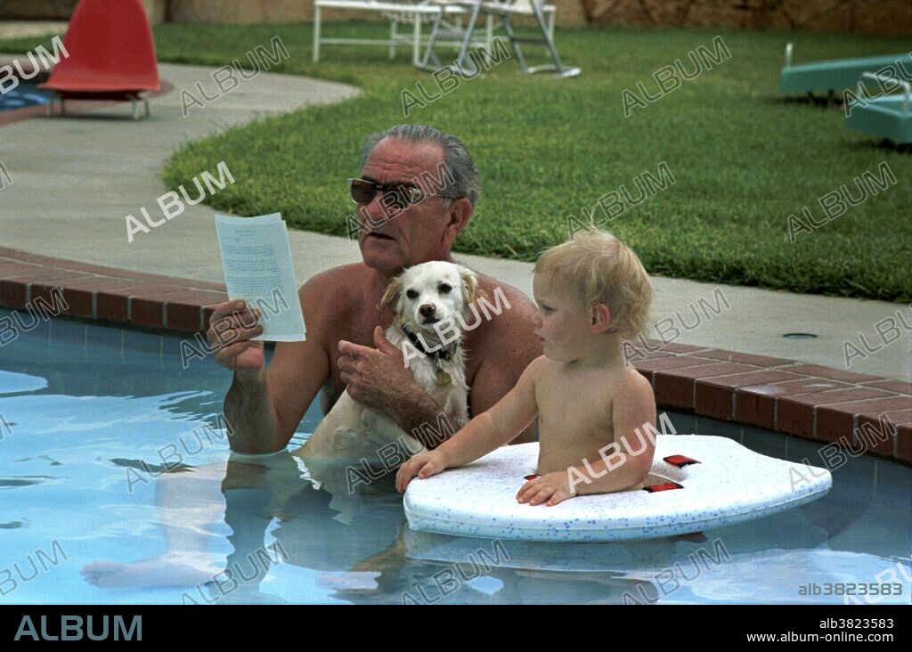 President Johnson on his birthday in swimming pool with his dog, Yuki, and grandson, Patrick Lyndon Nugent, August 27,1968. Yuki was a mixed breed dog found by President Johnson's daughter, Luci Nugent, at a gas station in Texas on Thanksgiving Day in 1966, while on her way to the LBJ Ranch. She named the dog, Yuki, which means "snow" in Japanese. At first, Yuki lived with Luci, but while visiting the White House, Yuki won the President's heart and became his faithful companion. On the President's birthday, August 27, 1967, Luci told her father that he could keep Yuki. When President Johnson left office on January 20, 1969, Yuki returned to LBJ Ranch with the President on Air Force One. After Johnson's death in January 1973, Yuki went to live with Luci Johnson Nugent and her family. Yuki died in 1979.