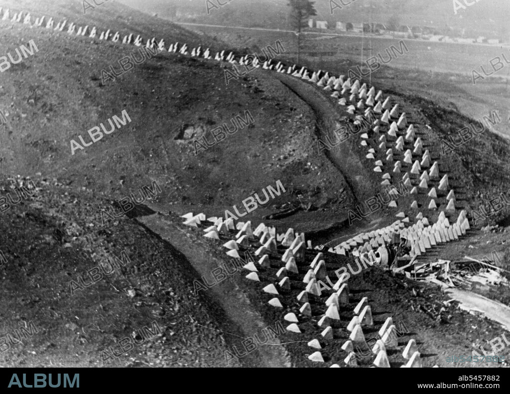 First Pictures Of Germany's Siegfried Line -- Over hill and down dale stretch these lines of reinforced concrete tank barriers - described as the gravestones of tanks.These are the first pictures of Germany's new Siegfried line fortifications along that Western frontiers, described as "The most modern ad astounding works of our time". October 25, 1938. (Photo by Keystone).