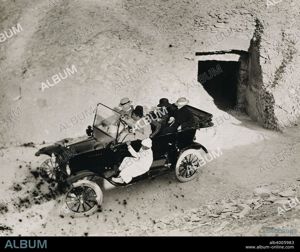 Lord Carnavon's first visit to the Valley of the Kings, Egypt, 1923. Lord Carnavon (1866-1923) and a party in a motor car. Carnarvon was archaeologist Howard Carter's financial backer in his excavations in the Valley of the Kings. The discovery of Tutankhamun's tomb in 1922 was one of the most astounding discoveries in archaeology. Tutankhamun was a previously unknown pharaoh whose name had been eradicated from historical records by one of his successors because of his association with the heretical pharaoh Akhenaten, who was Tutankhamun's father-in-law. Consequently his tomb, uniquely, had remained undisturbed by grave robbers.