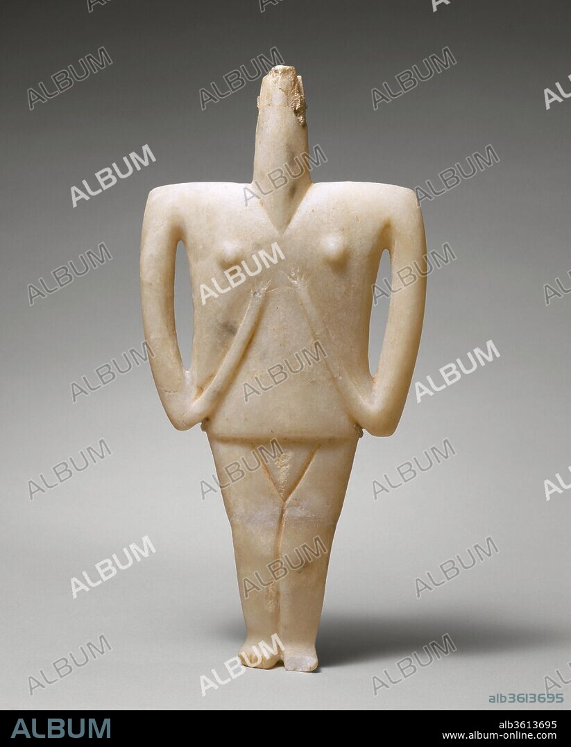 Marble female figure. Culture: Cycladic. Dimensions: H. 10 3/4 in. (27.3 cm). Date: 2300-2200 B.C..
The remains of an ancient repair are of special interest. The head had broken from the long thin neck. A channel was cut into the sides of the neck and the head and then filled with lead. This technique was an established means of joining pieces in the first millennium B.C. The repair thus may be contemporary with the piece or date from more than one thousand years later.