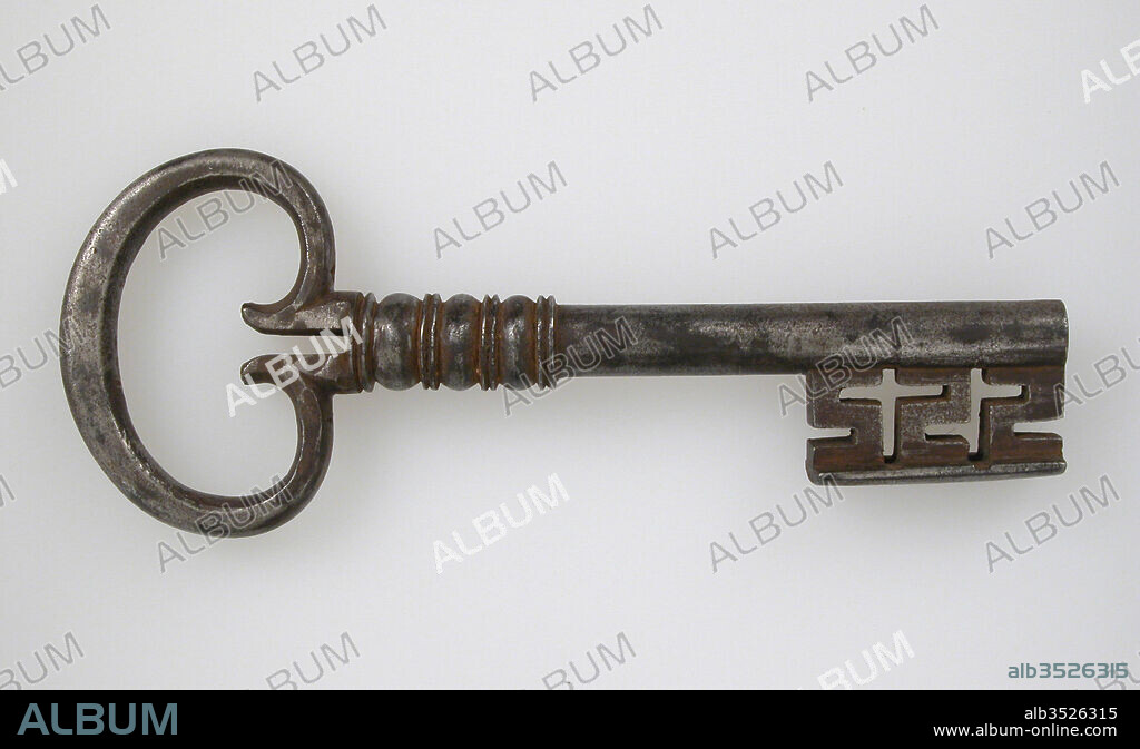 Key, 16th century, German, Iron, Overall: 8 1/16 x 3 1/8 x 3/4 in. (20.4 x 8 x 1.9 cm), Metalwork-Iron, The decoration of Gothic iron locks and keys was often elaborate and of the highest standard of workmanship. The motifs were frequently drawn from Gothic architecture, reproducing on a miniature scale complicated tracery patterns and even tiny statuettes.