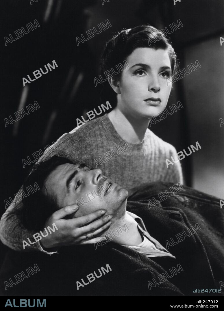 JAMES MASON and KATHLEEN RYAN in ODD MAN OUT, 1947, directed by CAROL REED. Copyright TWO CITIES.