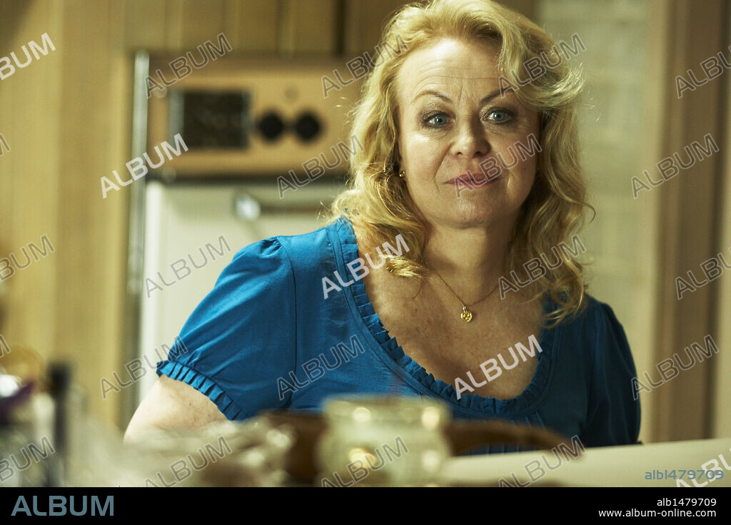 JACKI WEAVER in ANIMAL KINGDOM, 2010, directed by DAVID MICHOD. Copyright PORCHLIGHT FILMS/SCREEN AUSTRALIA / TSIAVIS, JOHN.