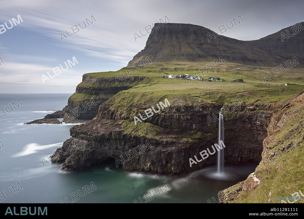 Beautiful coastal scenery beside the village of Gasadalur on the island of Vagar, Faroe Islands, Denmark, Europe.